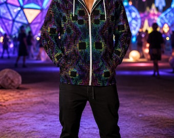May include: A zip-up hoodie featuring a dark fabric base with a vibrant, multi-coloured geometric grid pattern in shades of blue, purple, and green. The garment includes a white sherpa-style fleece lining, a white front zip, and white drawstrings.