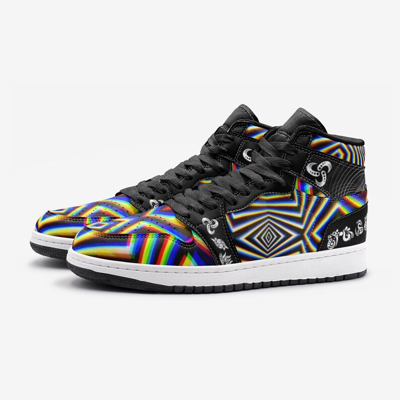 May include: Black high-top trainers with a colourful, psychedelic pattern. The pattern features a rainbow of colours, including red, orange, yellow, green, blue, indigo, and violet. The trainers have a white sole and black laces.