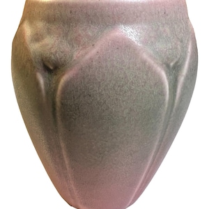 May include: A ceramic vase with a unique, textured surface. The vase has a rounded, tulip-like shape, with a gradient of colors from pink at the base to a muted green at the top. The design features subtle, vertical ridges.