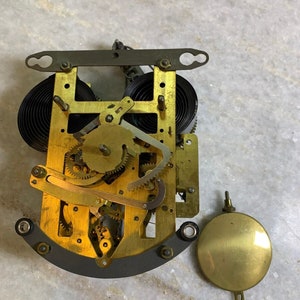 Antique brass clock parts key gears pendulum bell dong steampunk salvaged