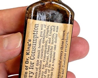 Antyczna butelka próbna Dr Kinga z 1885 roku, zapieczętowana etykieta, Chicago, Illinois