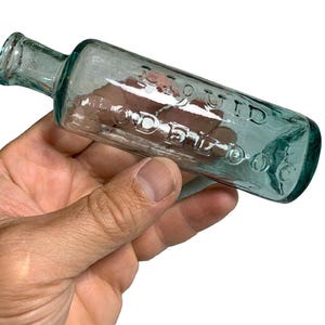 Rare antique 1850s open pontil opodeldoc liquid 1850s whittled medicine bottle