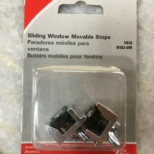 New national hardware aluminum sliding window stops movable v818 n183-699 2 pack
