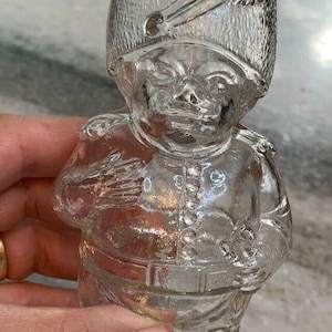 Antique ebmossed british king&#39;s queen&#39;s grenadier soldier guard glass bottle