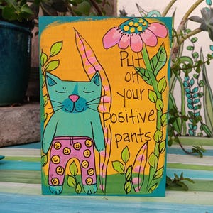 Divertido arte gatuno pintado a mano: Letrero de madera "Positive Pants" (18x13 cm)