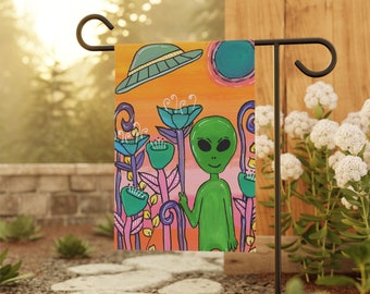 Little Green Alien giving the peace sign - 18 x 12" Garden & House Banner - UFO UAP Garden Flag - alien theme with colorful flowers