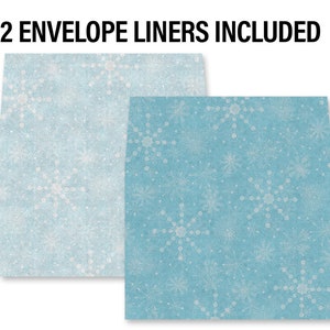 May include: Two blue envelope liners with a white snowflake pattern. The text "2 ENVELOPE LINERS INCLUDED" is printed at the top of the image.