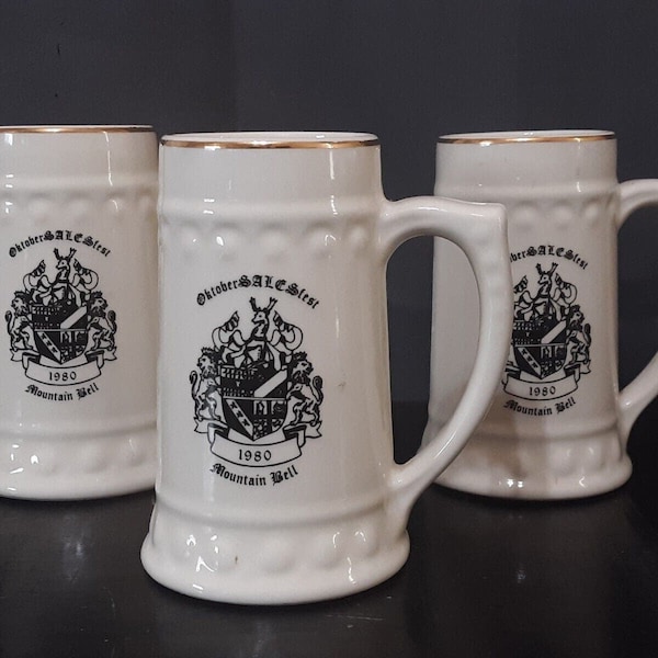 Vintage Oktober Sales Fest 1980 Mountain Bell Festival Ceramic Beer Steins Mugs