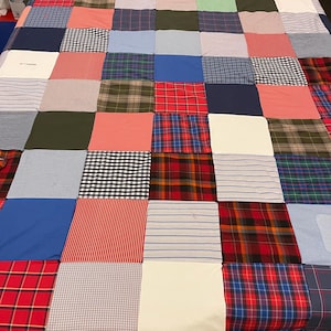 Memory quilt full size made for you from loved ones items