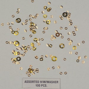 Dial washers hour wheel watch parts watchmakers spares assorted copper/brass