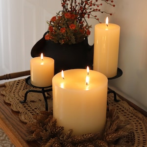 Velas brancas, sem perfume ou de baunilha francesa, várias opções de tamanho.