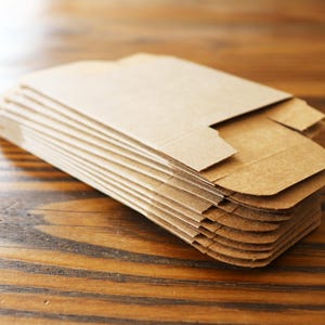 Cajas de jabón de papel artesanal reciclado. Juego de 12.
