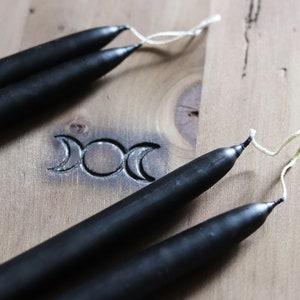Primitive Hand Dipped Black Taper Candles in various size options.