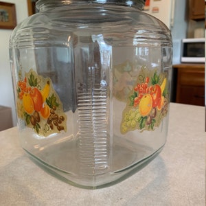Large Ribbed Jar With Applied Floral Red Screw Top
