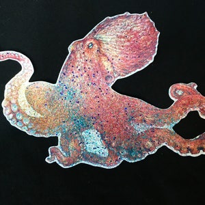 May include: A glittery, pink and purple octopus with a detailed drawing of its body and tentacles. The octopus is drawn in a cartoon style and has a whimsical feel.