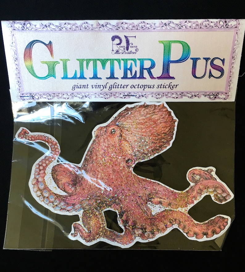 May include: A large pink glitter octopus vinyl sticker with the text "Glitter Pus" and "giant vinyl glitter octopus sticker" on the packaging.