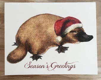 Platypus Santa Christmas card, "Season's Greetings", cute funny quirky animal holiday santa hat card or card set