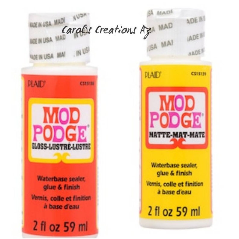 May include: Two bottles of Mod Podge, a water-based sealer, glue, and finish. One bottle is red with "Gloss-Lustre-Lustre" text, and the other is yellow with "Matte-Mat-Mate". Each bottle contains 2 fl oz (59 ml).