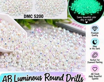 May include: A collection of white AB finish round drills for diamond painting, labelled DMC 5200. The small, faceted beads feature an iridescent coating and glow in the dark. The image displays square and round drill options and text.