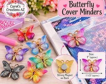 May include: A collection of butterfly-shaped diamond painting cover minders in various gradient colors including pink, blue, purple, green, and black. Each features a gold-tone body and a strong magnet on the back, measuring 1 inch by 1.5 inches.