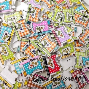May include: A collection of colorful wooden sewing machine buttons. The buttons are decorated with various patterns, including polka dots, plaid, and stripes. The buttons have two holes for sewing.
