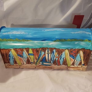 Hand painted standard mailbox. Painted in a row of surf boards  on the beach.   Sealed and uv protected