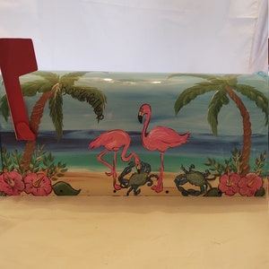 Hand painted standard mailbox. Painted in curious flamingos and blue crabs on the beach.   Sealed and uv protected