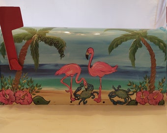 Hand painted standard mailbox. Painted in curious flamingos and blue crabs on the beach.   Sealed and uv protected