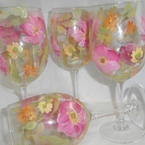 Hand painted pink poppies and yellow floral goblets. . Made in the usa.   Set of 4. 12 ounces each.  Hand painted.