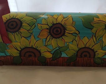 Hand painted standard mailbox. Painted in pretty sunflowers with teal background.  Sealed and uv protected,
