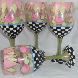 Hand painted roses, checks and marquis style white wine goblets. Set of 4 19 ounce goblets, black, white, pink green,gold.