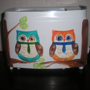 Hand painted 2 slice toaster. painted on both sides, sealed, washable, functional.