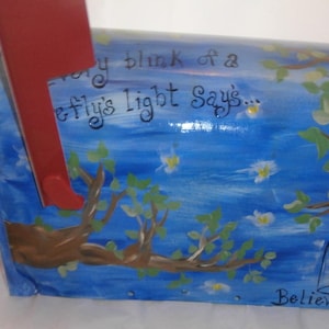 Hand painted standard mailbox. Painted in Fireflies(lightening bugs), trees, mason jar and "Believe". Sealed and uv protected