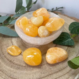 Orange calcite smooth tumbled stone 15-30mm