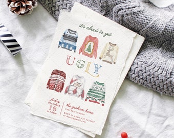 May include: A stack of cream-colored paper invitations with watercolor illustrations of ugly Christmas sweaters. The text "it's about to get UGLY" is displayed above the sweater designs. The invitation includes event details.