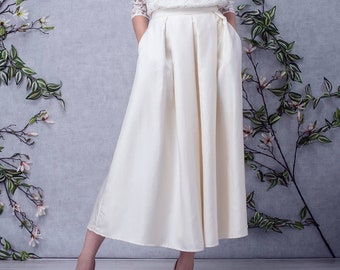 Jupe mariage longueur cheville. Jupe à plis longueur midi avec poches pour robe de mariée. Jupe années 50 blanc  cassé