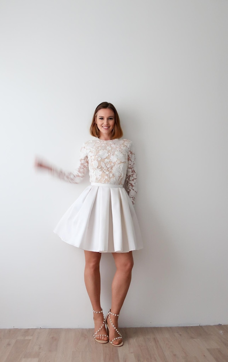 Robe de mariée Faith courte blush dentelle manches longues