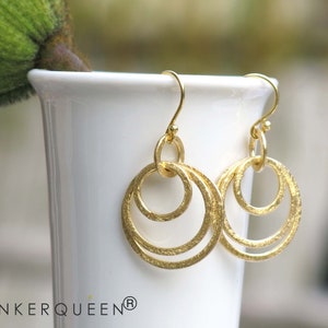 Earings, creoles in gold, small version image 1