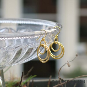 Earings, creoles in gold, small version image 2