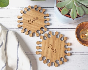 Set of two coasters personalised oak hexagon jigsaw coasters