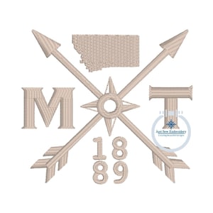 May include: A beige embroidered design featuring the letters "MT" with a compass rose and arrows. The state of Montana is outlined above the letters. The year "1889" is below the compass rose.