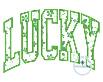 May include: Green and white embroidery design of the word "LUCKY" with a shamrock pattern. The design is outlined in green and has a white background.