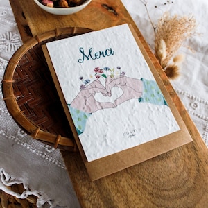 carte à planter Merci coeur avec les doigts
