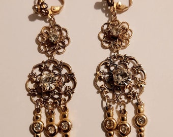 Three tier gold tone vintage dangling pierced earrings with rhinestones