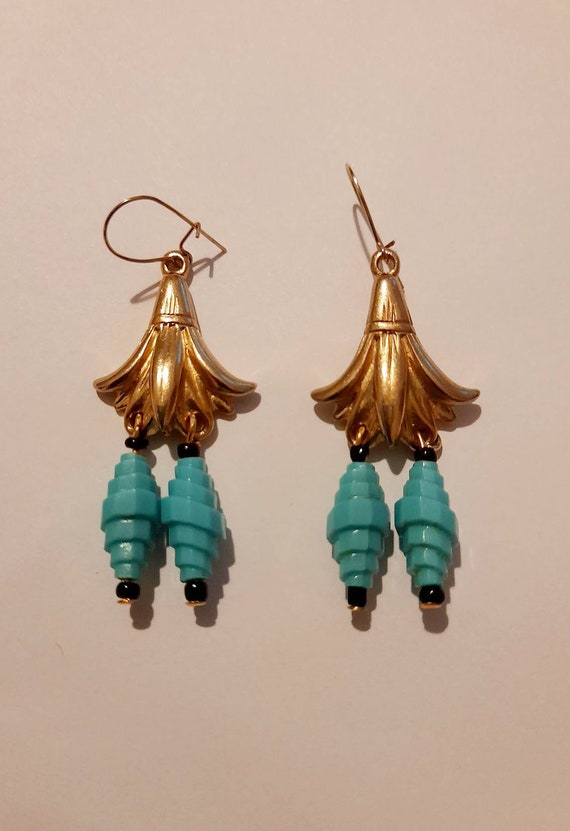 Antique gold tone pierced earrings, stylized lotus