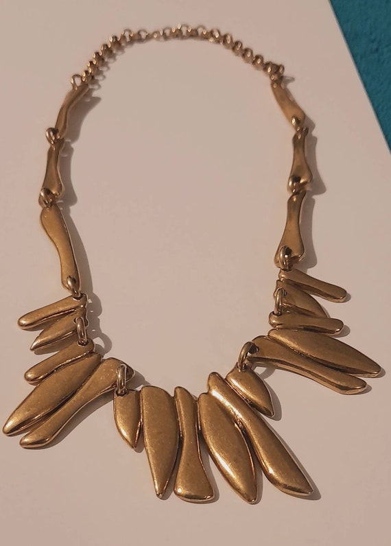 Very avant shop garde gold paparazzi
