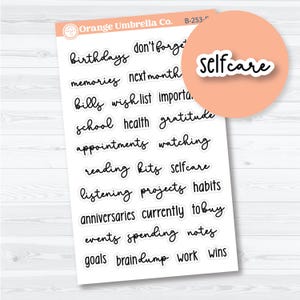 May include: A sheet of planner stickers with various words in black script, including "birthdays," "selfcare," and "goals." A peach-colored circle with the word "Selfcare" is in the upper right corner. The brand name "Orange Umbrella Co." is visible.