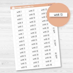 May include: A sheet of white stickers with the text "Week" and numbers 1 to 51. The sheet is labelled "Orange Umbrella Co." and includes a close-up of a sticker that says "Week 15".