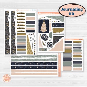 May include: A journaling kit featuring stickers and labels in gold, navy, and blush pink. The kit includes stickers with days of the week, labels, and decorative elements. The words "Journaling Kit" are in a circular banner. The kit is designed for journaling.