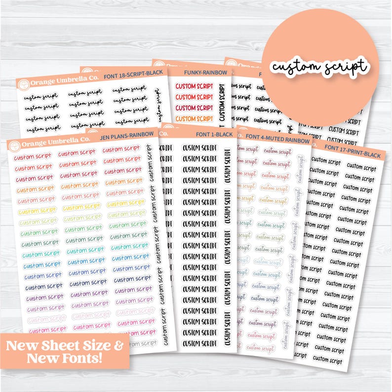May include: A collection of sticker sheets featuring the text "custom script" in various fonts and colors. The sheets are labeled with font names and the brand "Orange Umbrella Co." A circular sticker with the words "custom script" is also present.